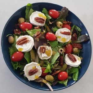 Goatcheese salad with pecan nuts and cherry tomatoes